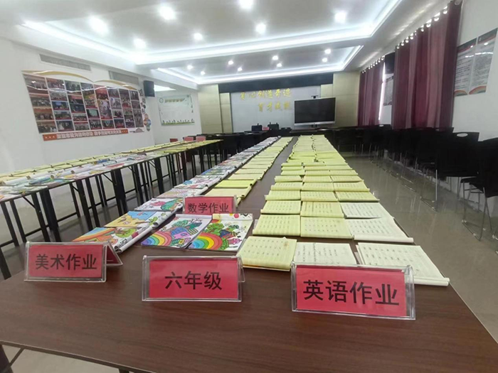以评比促提高 以示范促规范